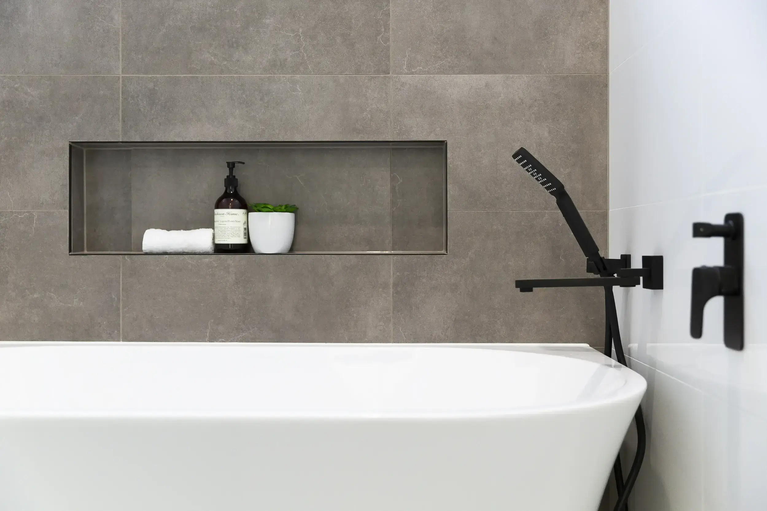 Bathroom renovation Markham featuring Asian-inspired design with smart toilet, frameless shower and luxury finishes