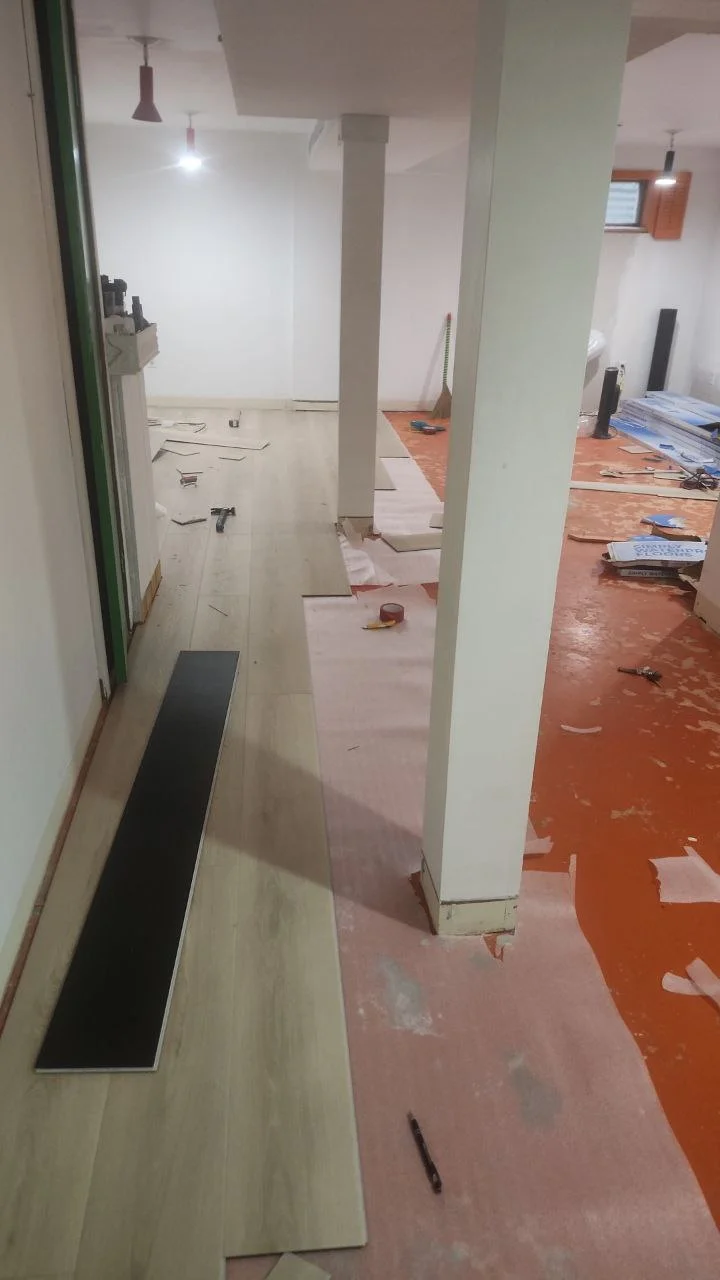 Basement After Renovation - Finished legal suite with kitchen