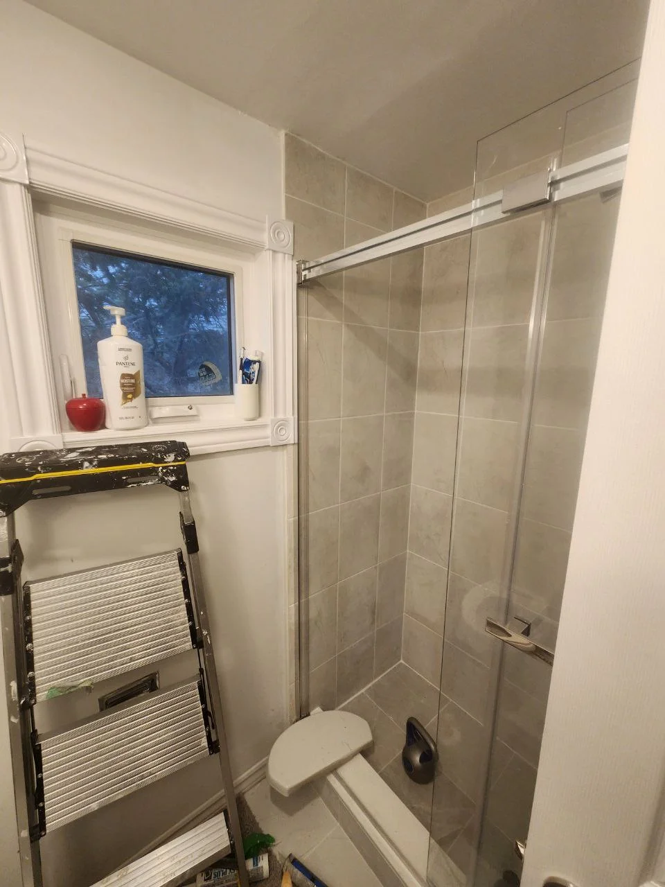 Bathroom After Renovation - Modern vanity and frameless shower