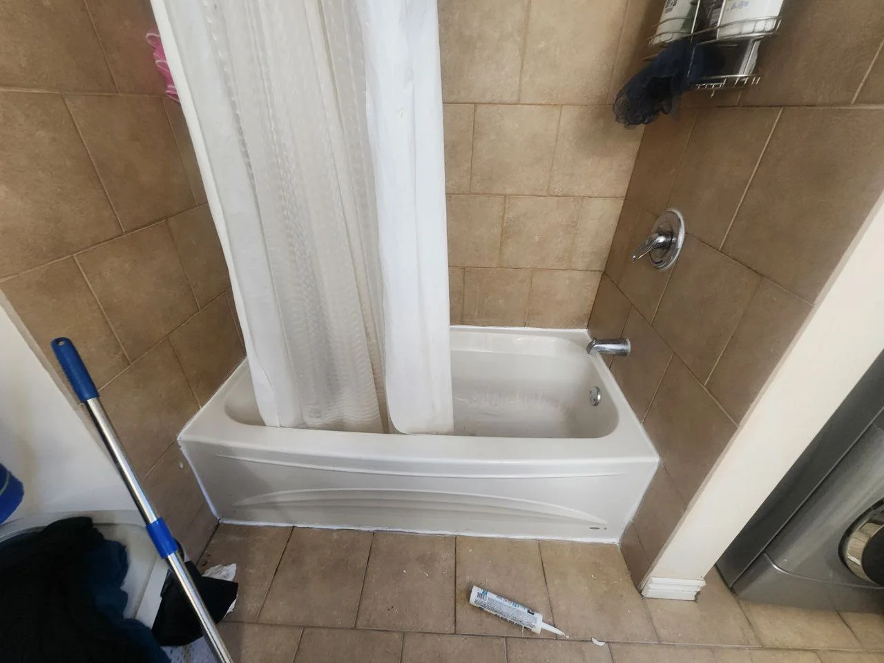 Bathroom Before Renovation - Outdated vanity and tile