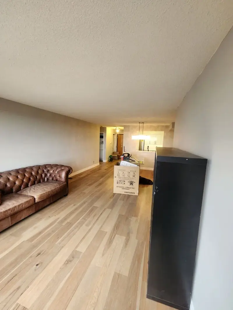 Condo renovation in Toronto with modern kitchen and open concept design